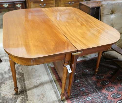 A Regency mahogany drop leaf extending dining table, closed ...