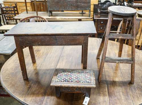 An 18th century oak low table, width 74cm, height 32cm, a ca...