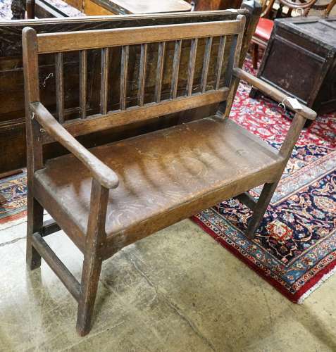 A late 18th century oak chair back settle, width 91cm, depth...