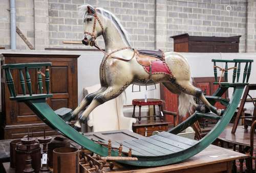 A large Victorian style painted rocking horse with end seats...