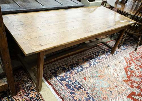 A Cotswold style oak and pine refectory table, with single p...