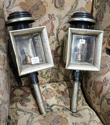 A pair of Victorian painted and polished steel carriage lamp...