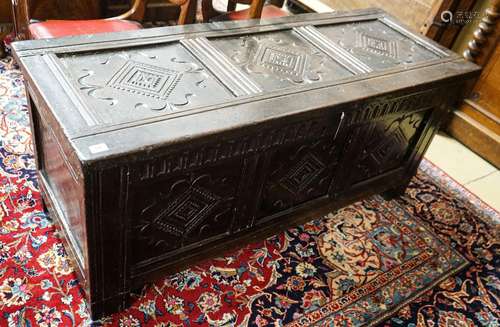 A late 17th/early 18th century carved and panelled oak coffe...