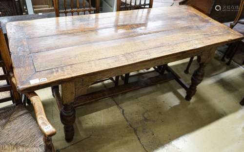 A 17th century style oak refectory table, with cup and cover...