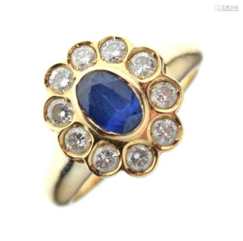 Unmarked yellow metal sapphire and diamond ring