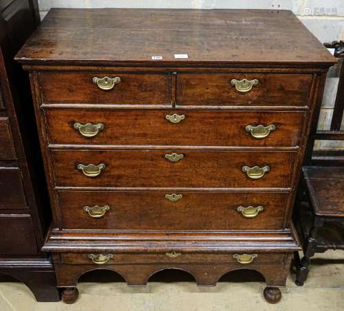 An early 18th century oak chest on stand, fitted two short a...
