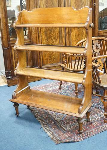 A late 19th century mahogany campaign four tier open bookcas...