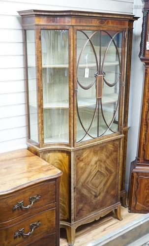 A Sheraton Revival mahogany display cabinet, crossbanded and...