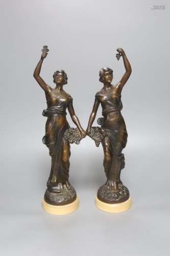 A pair of patinated spelter figures 37cm