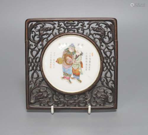 A 19th century Chinese famille rose circular plaque or cover...