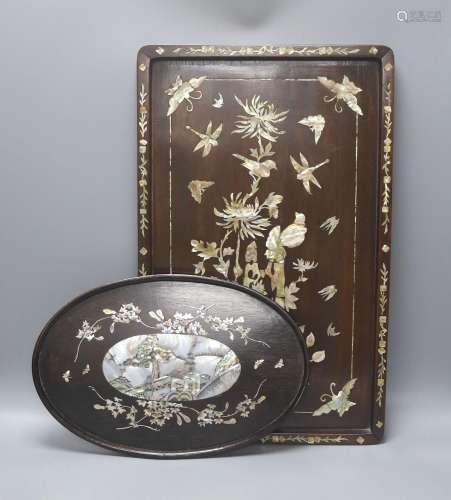 Two Chinese mother of pearl inlaid hongmu trays, the rectang...