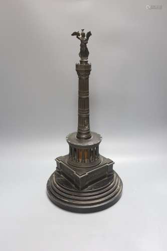A 19th century Grand Tour patinated spelter model of a colum...