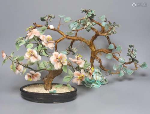 A pair of Chinese glass models of trees, tallest 29 cm