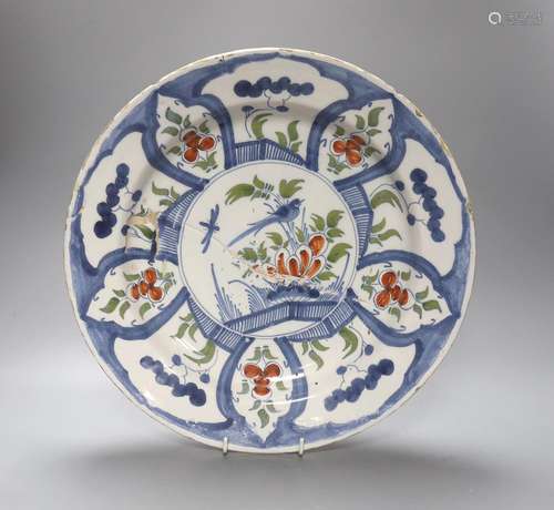 An 18th century Delft polychrome dish 35cm