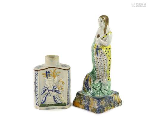 A Staffordshire Prattware pearlware tea caddy and figure of ...