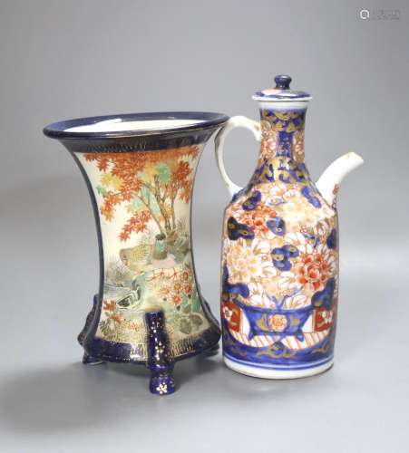 A Japanese Imari sake jug and a Satsuma pottery blue ground ...