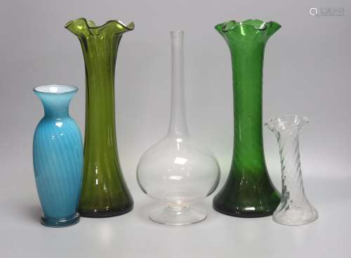 Two green glass hyacinth vases, a carafe and two other vases...