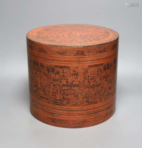 A large Burmese red and black lacquer betel box and cover wi...