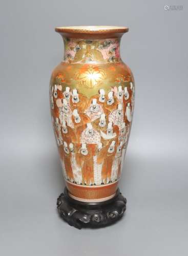 A tall Japanese Kutani porcelain vase, decorated with Rakan,...
