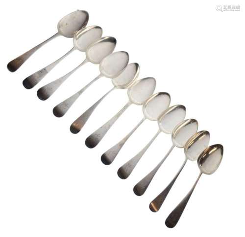 Eleven Old English pattern silver dessert spoons