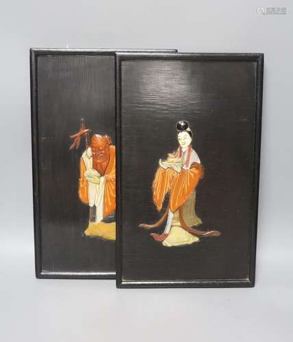 A pair of Chinese soapstone inlaid lacquer panels of two imm...