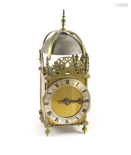 A 17th century style brass lantern clockwith single hand and...