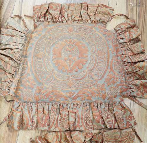 A pair of Fortuni Orsini pattern seat cushions in rust and g...