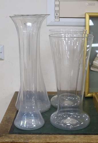 A pair of large glass vases and two similar fluted vases, la...