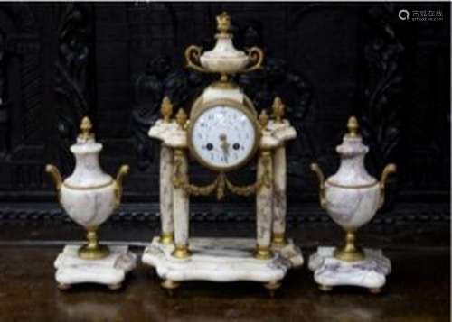 A late 19th century French three piece clock set, in Louis X...