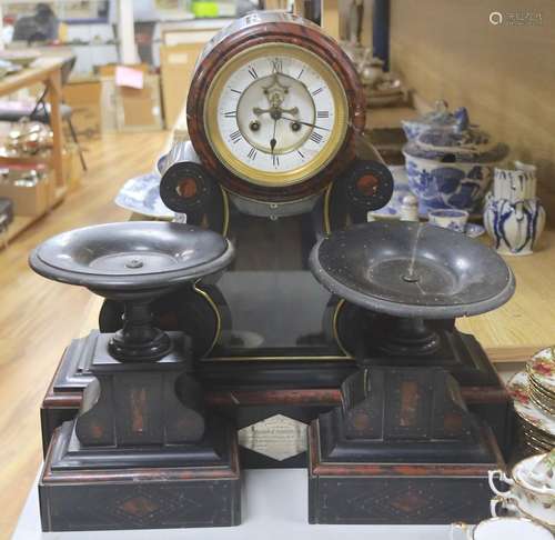 A 19th century Victorian slate clock garniture, the movement...