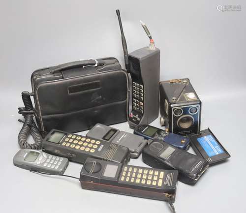 Eight early/retro mobile phones and a Box Brownie