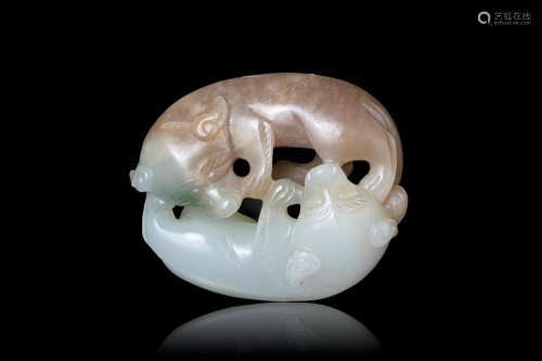 A BROWN AND WHITE JADE ‘DOUBLE-BADGERS’ CARVING, SHUANGHUAN ...
