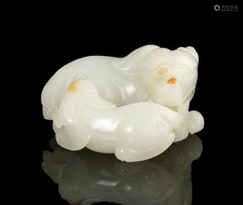 A RUSSET AND WHITE JADE ‘DOG AND CUB’ GROUP China, Modern L:...