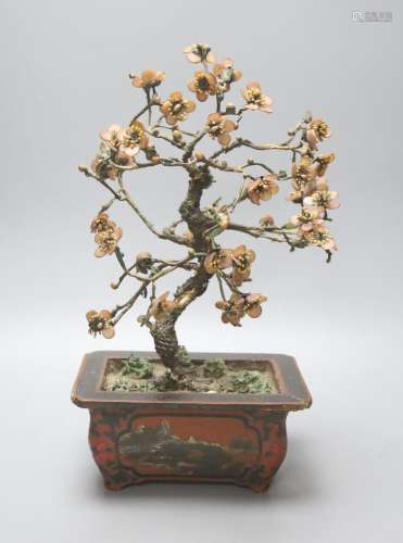 An early 20th century Chinese coloured glass and lacquer mod...