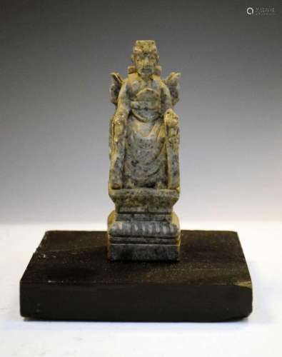 Carved soapstone seated figure