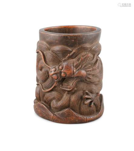 A DEEPLY CARVED ‘DRAGON’ BAMBOO BRUSHPOT China, Late Qing Dy...