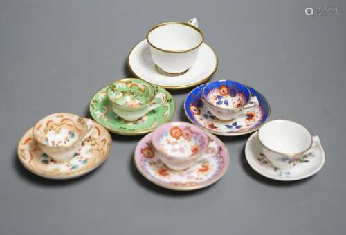 Five Staffordshire miniature teacups and saucers, possibly A...