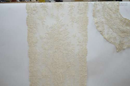 A mixed Brussels lace berth with fine needle lace floral ins...