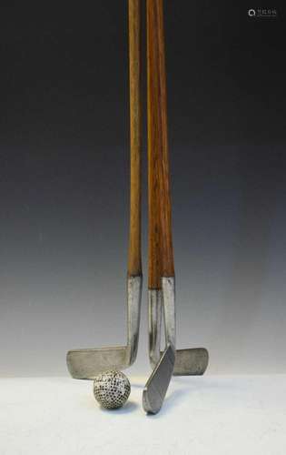 Three early 20th Century golf clubs