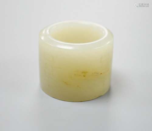 A 19th century Chinese pale celadon jade archer’s thumb ring...