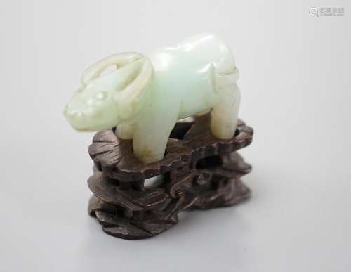 A small Chinese jade figure of a buffalo, late 19th/early 20...