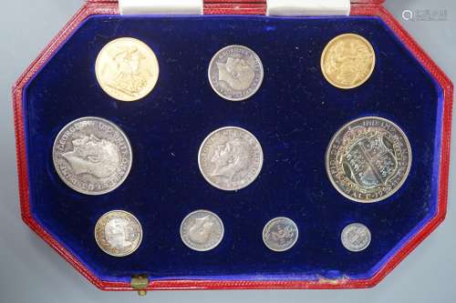 A George V specimen coin set 1911, comprising gold sovereign...