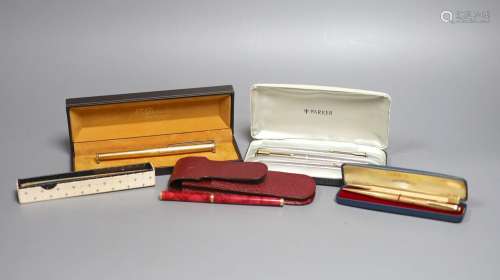 A Parker pen trio, boxed Parker fountain pen, other pens and...