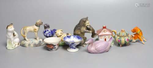 A quantity of miniature ceramic pots, figurines, animal orna...