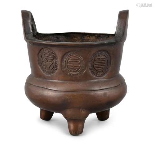 AN INSCRIBED BRONZE THREE-LEGGED ARCHAISTIC VESSEL China, Mi...