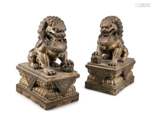 A PAIR OF HEAVY CASTED TEMPLE SIZED GILT LACQUERED BRONZE FU...