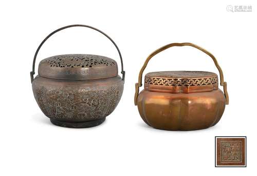 A GROUP OF TWO (2) RETICULATED COPPER HANDWARMERS IN THE MAN...