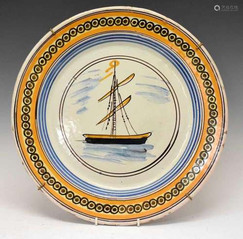 Late 19th/early 20th Century tin-glazed earthenware charger