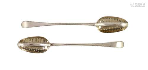 A pair of George III silver feather edge Old English pattern...