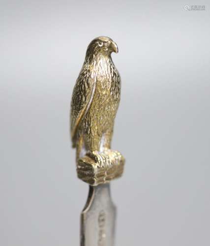 A modern parcel gilt silver letter opener, with eagle termin...